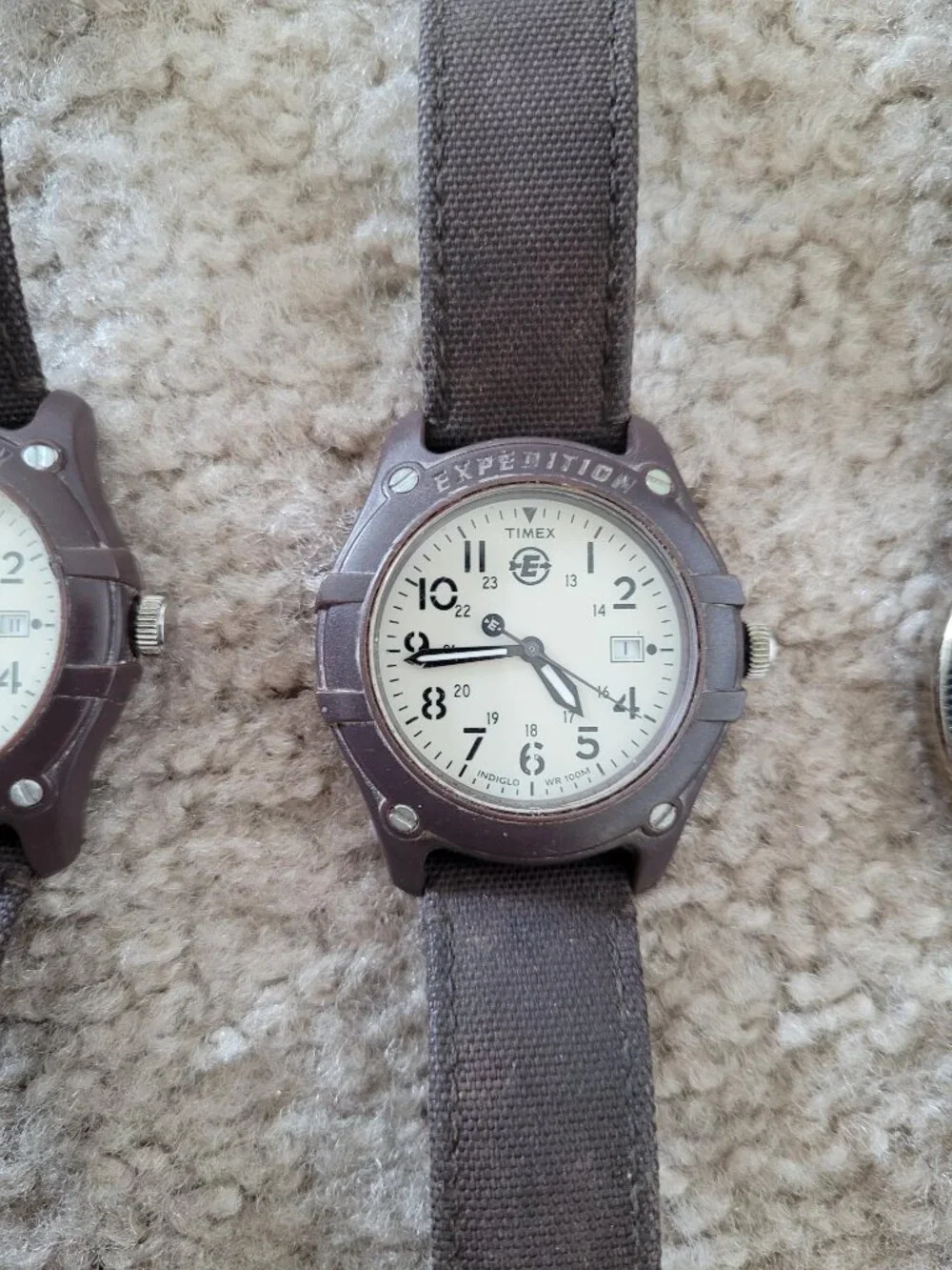 Four men's Timex watches with Indiglo in good condition